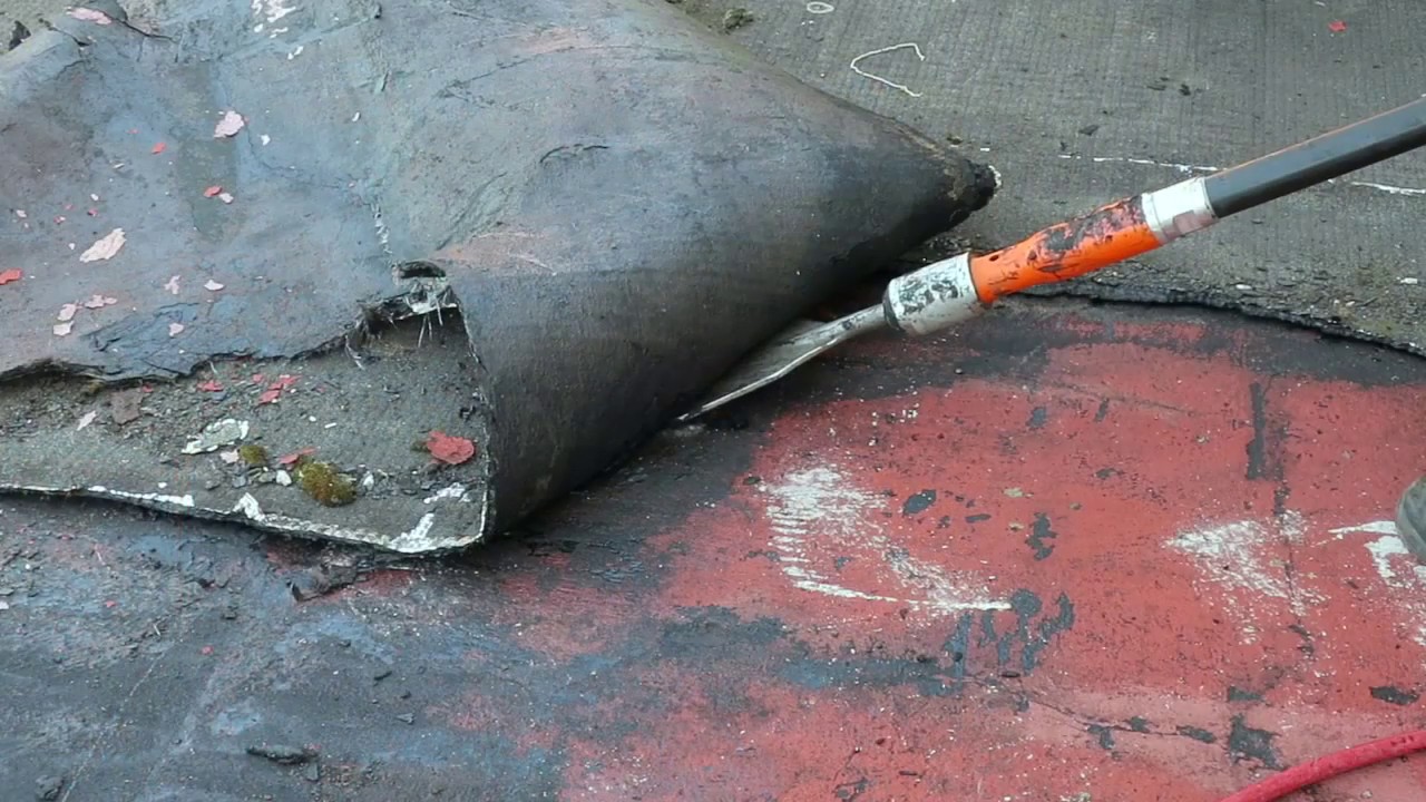 Dépose complète de l'ancien complexe d'étanchéité sur toiture-terrasse